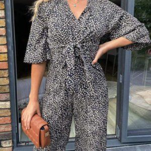 SOLD AX Paris_ WOMEN'S BLACK AZTEC Front Tie JUMPSUIT SZ 8